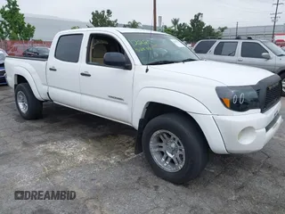 2009 Toyota Tacoma PreRunner z VIN 3TMKU72N49M020938, wystawiony jako IAAI lot #42422101 z przebiegiem 89 335 mil mil oraz . Historia ofert i sprzedaży dostępna na DreamBid. Obrazek 1.
