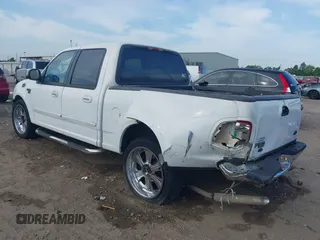 2001 Ford F-150 XLT with VIN 1FTRW07L81KE91672, listed as a IAAI auction lot 42021661 with 200,000 mi miles and . Bid and sale history available at DreamBid. Image 3.