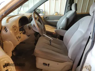 2003 Dodge Caravan Sport with VIN 2D4GP44L73R101409, listed as a Copart auction lot 51632205 with 242,567 mi miles and Salvage Title. Bid and sale history available at DreamBid. Image 7.