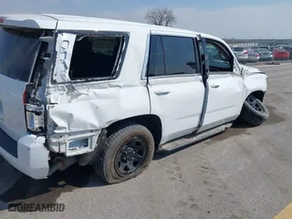 2020 Chevrolet Tahoe Commercial with VIN 1GNSKDEC5LR261015, listed as a IAAI auction lot 42001083 with 110,668 mi miles. Bid and sale history available at carsss.com. Image 17.