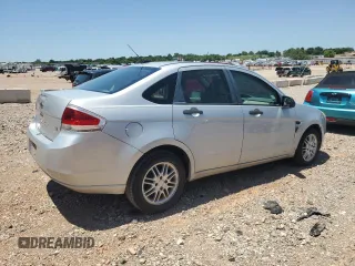 2008 Ford Focus SE z VIN 1FAHP35N78W115746, wystawiony jako Copart lot #60981575 z przebiegiem 195 035 mil mil oraz Czysty tytuł • Clean title. Historia ofert i sprzedaży dostępna na DreamBid. Obrazek 3.