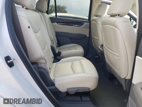 2023 Cadillac XT6 FWD Premium Luxury with VIN 1GYKPCRS5PZ120161, listed as a Copart auction lot 54614235 with 39,700 mi miles and Salvage title. Bid and sale history available at DreamBid. Image 11.