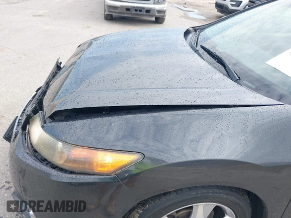 2012 Acura TSX with VIN JH4CU2F45CC016817, listed as a IAAI auction lot 42104700 with 148,617 mi miles. Bid and sale history available at carsss.com. Image 18.