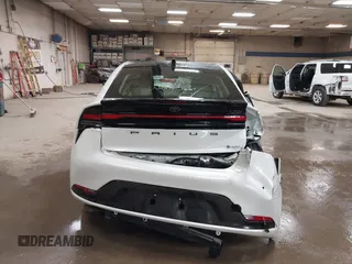 2024 Toyota Prius LE z VIN JTDADABU6R3024846, wystawiony jako IAAI lot #42256141 z przebiegiem 2 840 mil mil oraz . Historia ofert i sprzedaży dostępna na DreamBid. Obrazek 16.