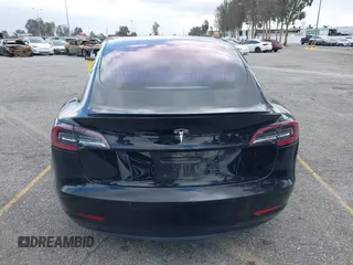 2018 Tesla Model 3 Long Range Battery with VIN 5YJ3E1EA9JF009384, listed as a IAAI auction lot 41544624 with 66,896 mi miles and . Bid and sale history available at DreamBid. Image 16.
