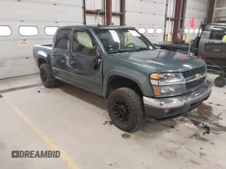 2007 Chevrolet Colorado 1LT z VIN 1GCDT13E278198615, wystawiony jako IAAI lot #41921366 z przebiegiem 160 542 mil mil oraz . Historia ofert i sprzedaży dostępna na DreamBid. Obrazek 1.