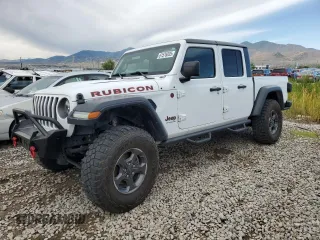 2020 Jeep Gladiator Rubicon with VIN 1C6JJTBG4LL126949, listed as a Copart auction lot 61576835 with 75,919 mi miles and Salvage title. Bid and sale history available at DreamBid. Image 1.