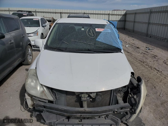 2011 Nissan Versa 1.8 S with VIN 3N1BC1CPXBL396431, listed as a Copart auction lot 49494335 with 94,050 mi miles and Salvage Title. Bid and sale history available at carsss.com. Image 5.