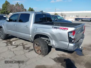 2018 Toyota Tacoma SR with VIN 3TMCZ5AN6JM185891, listed as a IAAI auction lot 41450665 with 53,749 mi miles and . Bid and sale history available at DreamBid. Image 3.