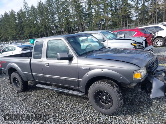 2009 Ford Ranger XLT with VIN 1FTYR44E89PA56696, listed as a IAAI auction lot 41939544 with 144,747 mi miles. Bid and sale history available at carsss.com. Image 13.