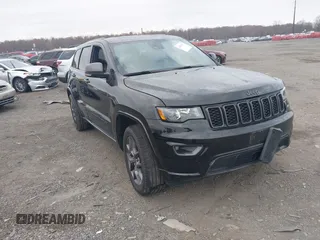 2021 Jeep Grand Cherokee 80th Anniversary z VIN 1C4RJFBG0MC857778, wystawiony jako IAAI lot #40899437 z przebiegiem 12 469 mil mil oraz . Historia ofert i sprzedaży dostępna na DreamBid. Obrazek 1.