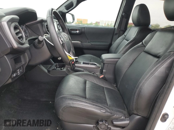 2019 Toyota Tacoma SR z VIN 3TMCZ5AN1KM190613, wystawiony jako Copart lot #57983795 z przebiegiem 41 627 mil mil oraz Szkoda całkowita • Salvage title. Historia ofert i sprzedaży dostępna na DreamBid. Obrazek 7.