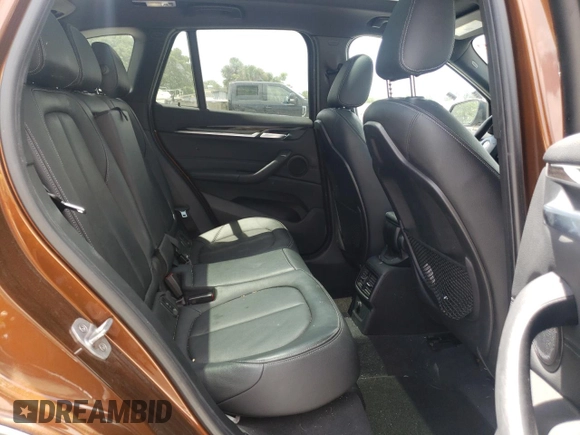2016 BMW X1 xDrive28i with VIN WBXHT3C31GP880132, listed as a Copart auction lot 69129132 with 74,759 mi miles. Bid and sale history available at carsss.com. Image 6.