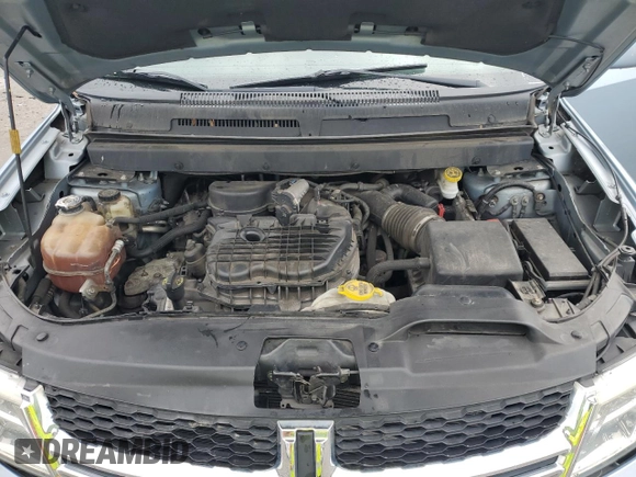 2013 Dodge Journey SXT with VIN 3C4PDCBG0DT619382, listed as a Copart auction lot 56565205 with 176,112 mi miles and Salvage title. Bid and sale history available at DreamBid. Image 12.