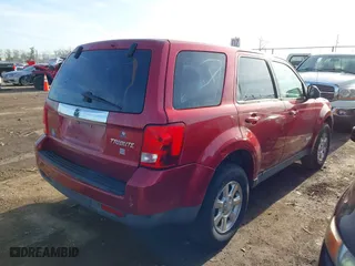 2008 Mazda Tribute Touring with VIN 4F2CZ02Z28KM25492, listed as a IAAI auction lot 42100730 with 231,093 mi miles. Bid and sale history available at carsss.com. Image 4.