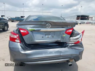 2016 Nissan Altima SR with VIN 1N4AL3APXGC227638, listed as a IAAI auction lot 42079982 with 167,303 mi miles and . Bid and sale history available at carsss.com. Image 16.