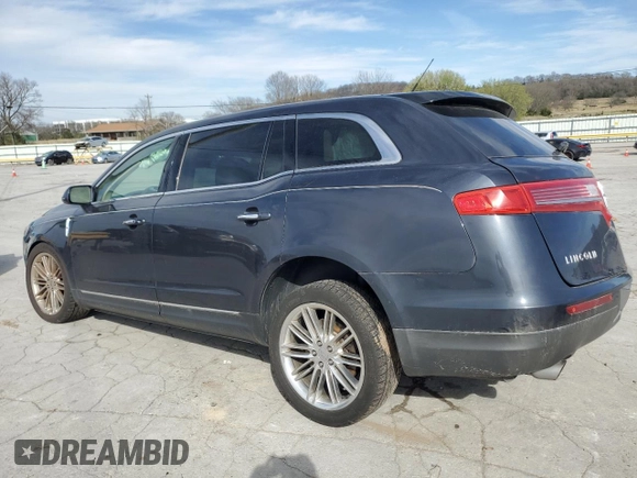 2014 Lincoln MKT EcoBoost with VIN 2LMHJ5AT1EBL57487, listed as a Copart auction lot 50182645 with 138,743 mi miles and Salvage Title. Bid and sale history available at DreamBid. Image 2.