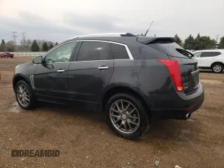 2014 Cadillac SRX Performance Collection z VIN 3GYFNCE36ES661204, wystawiony jako Copart lot #53478095 z przebiegiem 66 613 mil mil oraz Szkoda całkowita • Salvage title. Historia ofert i sprzedaży dostępna na DreamBid. Obrazek 2.