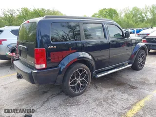 2011 Dodge Nitro Heat with VIN 1D4PU4GX2BW514237, listed as a IAAI auction lot 42109697 with 151,365 mi miles. Bid and sale history available at carsss.com. Image 4.