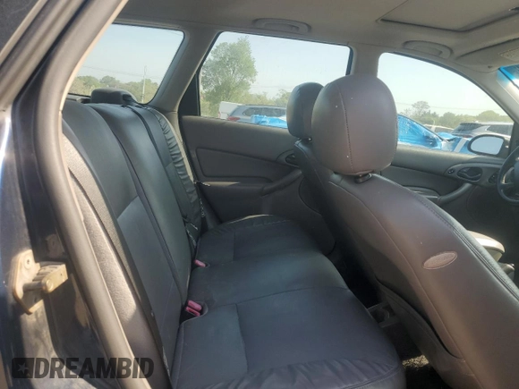 2003 Ford Focus with VIN 1FAHP36Z43W316899, listed as a Copart auction lot 55343955 with 178,646 mi miles and Salvage title. Bid and sale history available at DreamBid. Image 11.