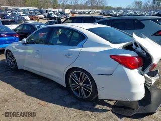 2015 Infiniti Q50 with VIN JN1BV7ARXFM390013, listed as a IAAI auction lot 41767784 with 175,739 mi miles. Bid and sale history available at carsss.com. Image 3.