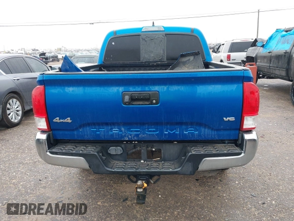2016 Toyota Tacoma SR with VIN 5TFCZ5AN4GX013233, listed as a IAAI auction lot 41394610 with 142,099 mi miles and . Bid and sale history available at DreamBid. Image 16.