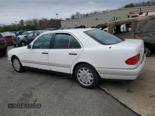 1996 Mercedes-Benz E-Class with VIN WDBJF55F5TJ022277, listed as a Copart auction lot 52597985 with 213,848 mi miles and Clean Title. Bid and sale history available at carsss.com. Image 2.