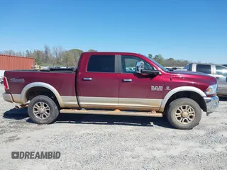 2017 Ram 2500 Laramie z VIN 3C6UR5FL6HG693953, wystawiony jako IAAI lot #41849571 z przebiegiem 99 754 mil mil oraz . Historia ofert i sprzedaży dostępna na DreamBid. Obrazek 13.