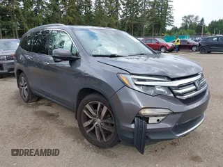 2017 Honda Pilot Touring with VIN 5FNYF6H95HB018627, listed as a IAAI auction lot 42534311 with 120,355 mi miles and . Bid and sale history available at DreamBid. Image 1.