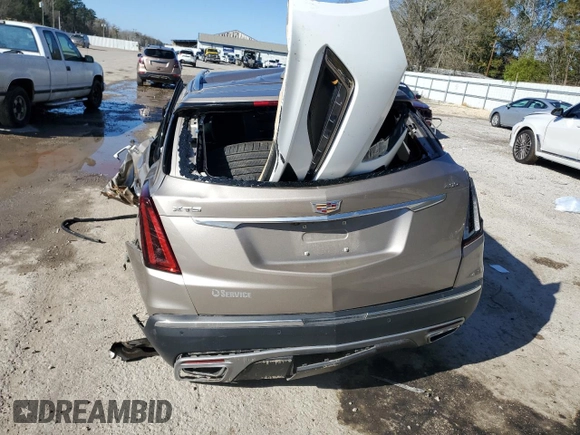 2022 Cadillac XT5 FWD Premium Luxury z VIN 1GYKNCRS8NZ112882, wystawiony jako Copart lot #86999544 z przebiegiem Nie podano mil oraz Szkoda całkowita • Salvage title. Historia ofert i sprzedaży dostępna na DreamBid. Obrazek 6.