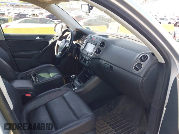 2011 Volkswagen Tiguan SE with VIN WVGBV7AX4BW528845, listed as a IAAI auction lot 42248245 with 224,808 mi miles and . Bid and sale history available at DreamBid. Image 5.