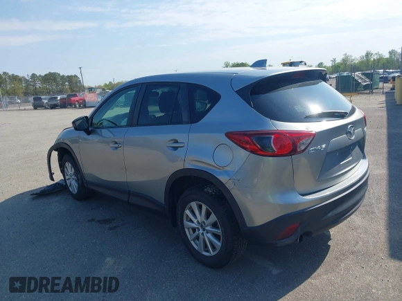 2014 Mazda CX-5 Touring with VIN JM3KE2CY9E0310315, listed as a IAAI auction lot 41943991 with 98,359 mi miles and . Bid and sale history available at carsss.com. Image 3.
