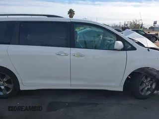 2014 Toyota Sienna SE with VIN 5TDXK3DC2ES472249, listed as a IAAI auction lot 41402101 with Not Provided miles and . Bid and sale history available at DreamBid. Image 12.