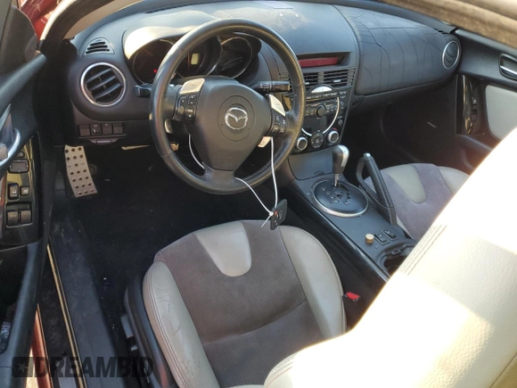 2006 Mazda RX-8 with VIN JM1FE173560205162, listed as a Copart auction lot 88785785 with Not Provided miles and Salvage Title. Bid and sale history available at DreamBid. Image 8.