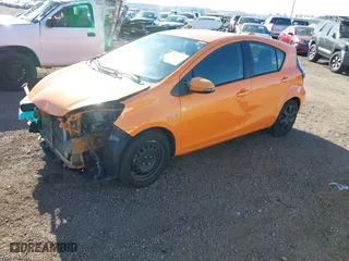 2015 Toyota Prius c One with VIN JTDKDTB36F1092272, listed as a IAAI auction lot 42001027 with 154,157 mi miles. Bid and sale history available at carsss.com. Image 18.