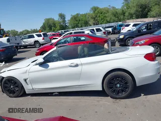2014 BMW 4 Series 428i z VIN WBA3V5C5XEJ969029, wystawiony jako IAAI lot #42421779 z przebiegiem Nie podano mil oraz . Historia ofert i sprzedaży dostępna na DreamBid. Obrazek 14.