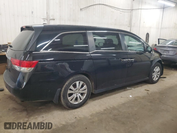 2015 Honda Odyssey EX-L with VIN 5FNRL5H62FB014772, listed as a Copart auction lot 55088925 with 144,152 mi miles and Salvage Title. Bid and sale history available at DreamBid. Image 3.