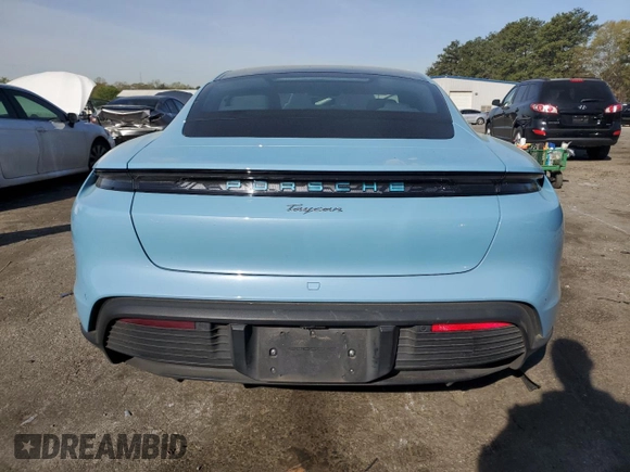 2023 Porsche Taycan with VIN WP0AA2Y11PSA11164, listed as a Copart auction lot 50695385 with 23,833 mi miles and Salvage Title. Bid and sale history available at DreamBid. Image 6.