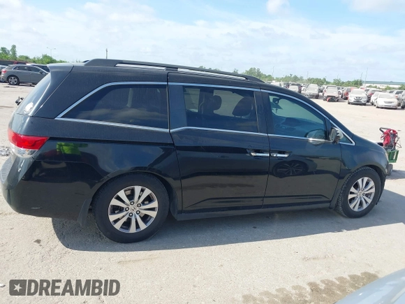 2015 Honda Odyssey EX-L with VIN 5FNRL5H68FB094983, listed as a IAAI auction lot 42031539 with 231,144 mi miles and . Bid and sale history available at DreamBid. Image 14.