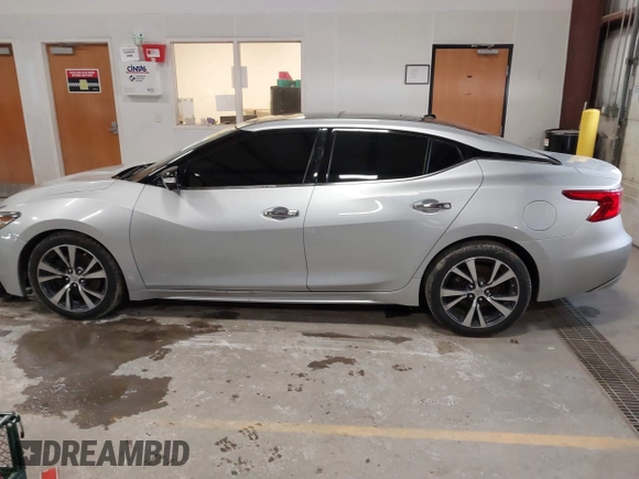 2016 Nissan Maxima SL with VIN 1N4AA6AP6GC384851, listed as a IAAI auction lot 41663659 with 127,247 mi miles and . Bid and sale history available at DreamBid. Image 14.