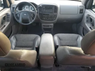 2002 Ford Escape XLS Choice with VIN 1FMYU01162KC61229, listed as a Copart auction lot 41985085 with 74,203 mi miles and Salvage title. Bid and sale history available at DreamBid. Image 8.