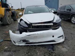 2023 Tesla Model Y Long Range z VIN 7SAYGDEE4PF797653, wystawiony jako Copart lot #58668985 z przebiegiem 35 520 mil mil oraz Szkody całkowita. Historia ofert i sprzedaży dostępna na DreamBid. Obrazek 5.