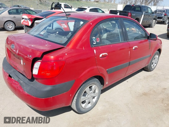 2009 Kia Rio SX with VIN KNADE223396484470, listed as a IAAI auction lot 41964027 with 167,380 mi miles. Bid and sale history available at carsss.com. Image 4.