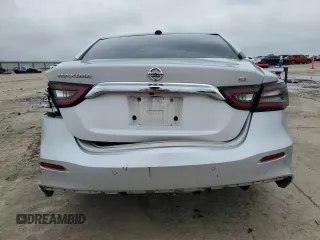 2019 Nissan Maxima SL z VIN 1N4AA6AV8KC372031, wystawiony jako Copart lot #54631325 z przebiegiem 102 361 mil mil oraz Szkoda całkowita • Salvage title. Historia ofert i sprzedaży dostępna na DreamBid. Obrazek 6.