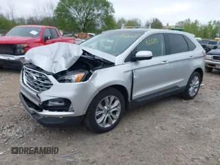 2019 Ford Edge Titanium with VIN 2FMPK4K99KBB56336, listed as a IAAI auction lot 42282600 with 52,422 mi miles and . Bid and sale history available at DreamBid. Image 2.