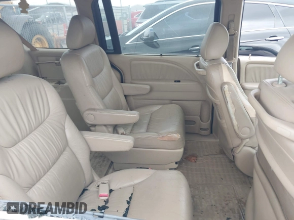 2007 Honda Odyssey EX-L z VIN 5FNRL38717B102646, wystawiony jako IAAI lot #42380196 z przebiegiem 234 088 mil mil oraz . Historia ofert i sprzedaży dostępna na DreamBid. Obrazek 8.
