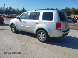 2011 Honda Pilot Touring with VIN 5FNYF4H96BB012122, listed as a IAAI auction lot 42071924 with 211,000 mi miles. Bid and sale history available at carsss.com. Image 3.