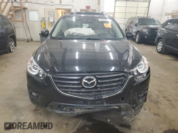 2016 Mazda CX-5 Grand Touring with VIN JM3KE4DY0G0854568, listed as a Copart auction lot 53259345 with 74,264 mi miles and Salvage Title. Bid and sale history available at carsss.com. Image 5.