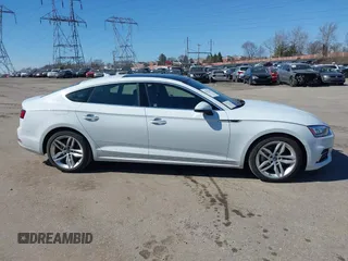 2019 Audi A5 Sportback Premium Plus with VIN WAUBNCF53KA023202, listed as a IAAI auction lot 41749214 with 40,716 mi miles and . Bid and sale history available at DreamBid. Image 14.