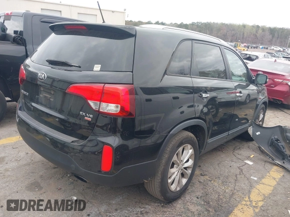 2014 Kia Sorento EX with VIN 5XYKUDA79EG431440, listed as a IAAI auction lot 41850576 with 103,758 mi miles. Bid and sale history available at carsss.com. Image 4.